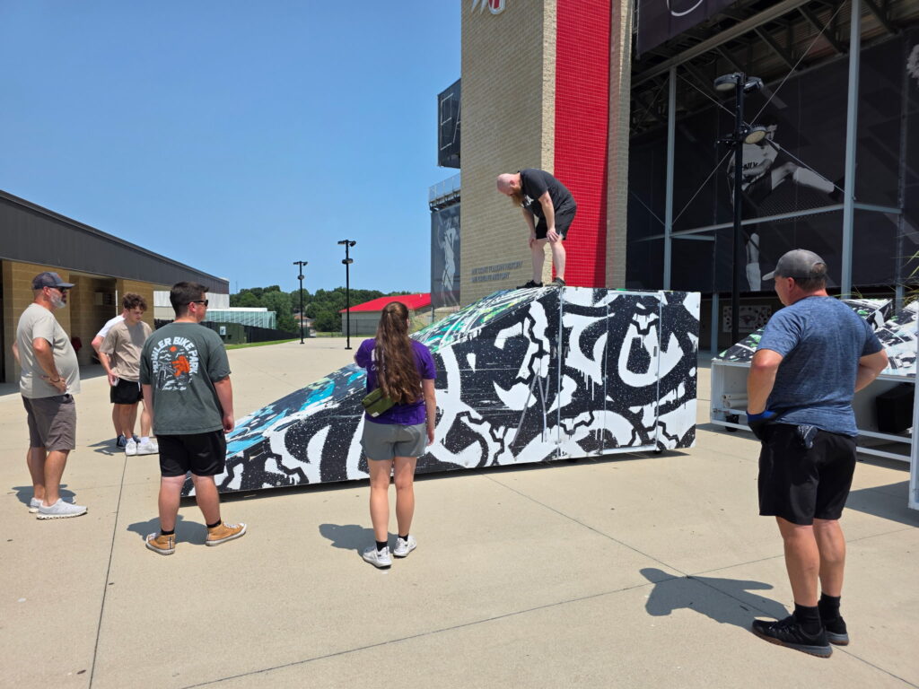 Volunteers inspecting a new show prop